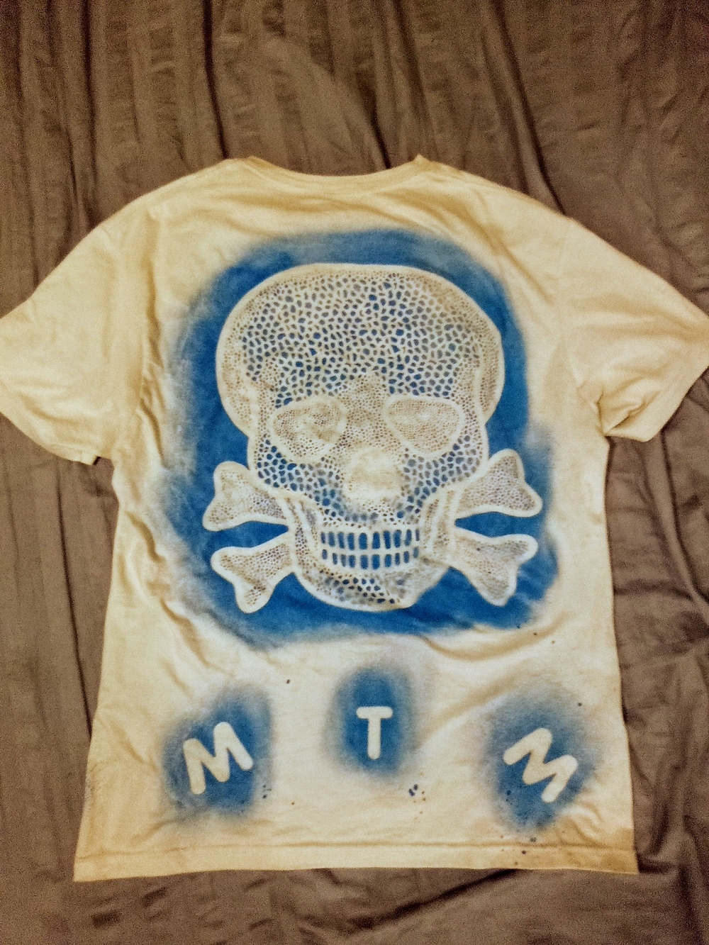 Cream Short Sleeve Tee with Blue Skull Graphic